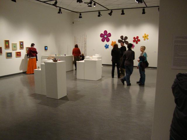 polychrome opening night (15).JPG - three clusters of plinths hold the mushroom sculptures, "an assent of polymen" and "playing in the rainbow"